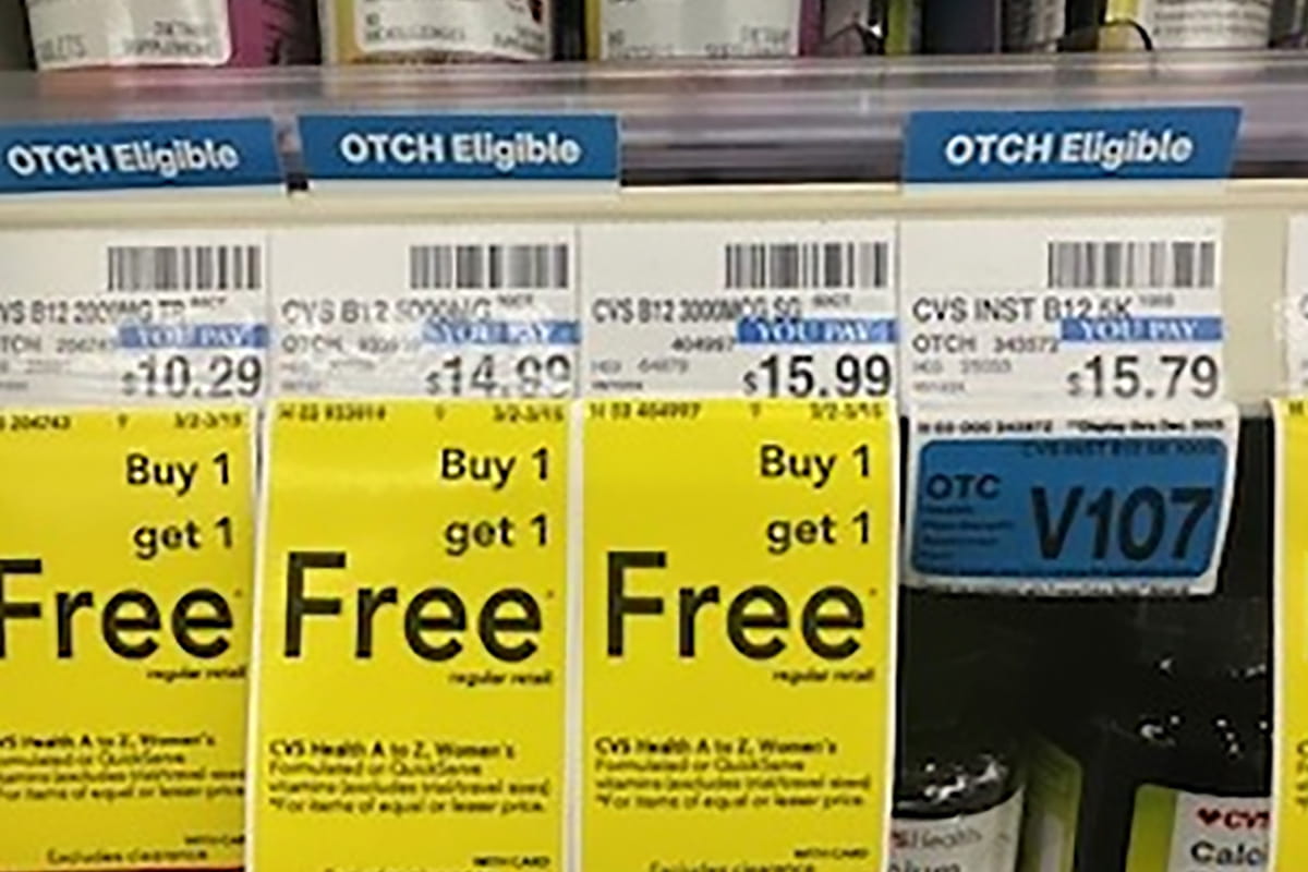 Pharmacy shelf product price tags.